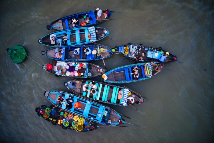 Explore Cai Rang Floating Market in your  south vietnam travel itinerary